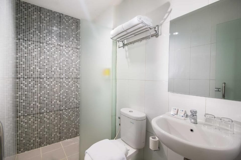 Shower, free toiletries, slippers, towels