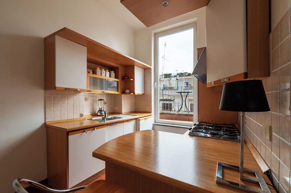 Apartment, 1 King Bed, Balcony | Private kitchen | Dining tables