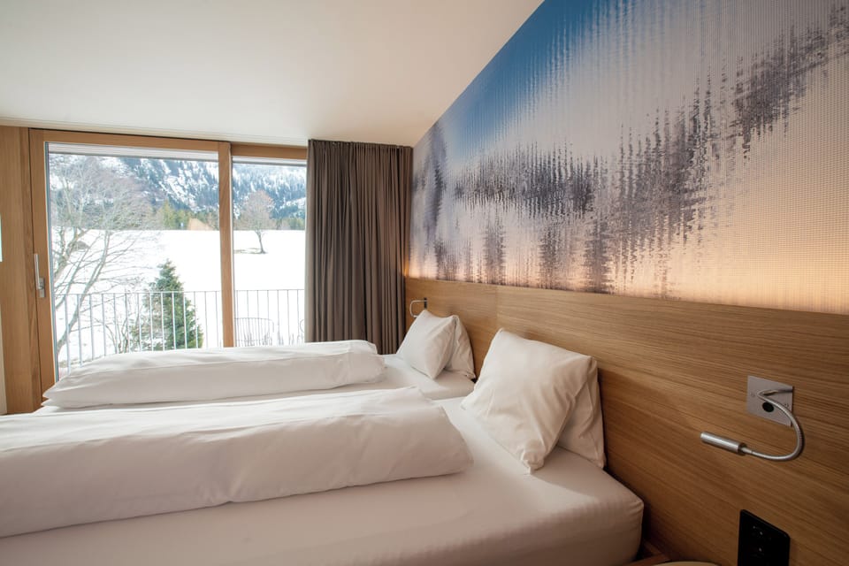 Deluxe Quadruple Room, Mountain View | Desk, laptop workspace, iron/ironing board, free WiFi