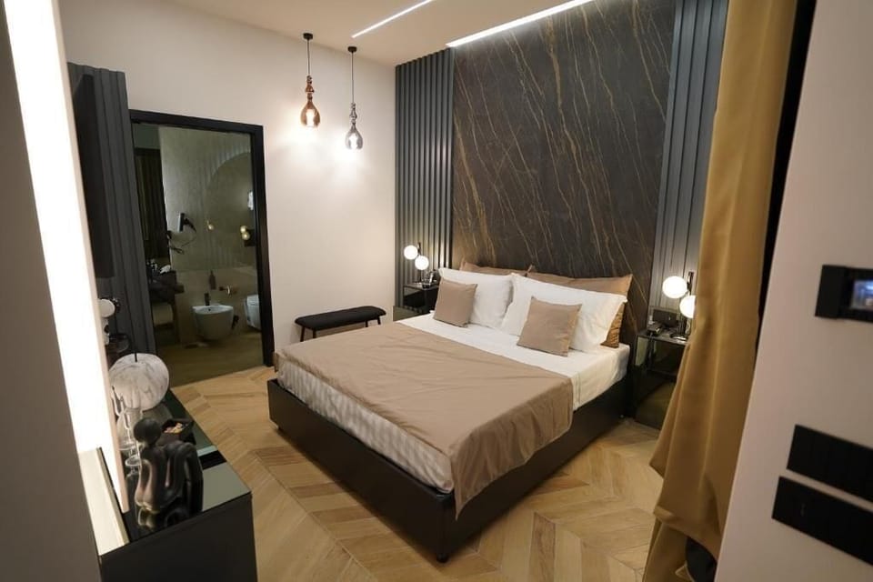 Deluxe Double Room, Patio | In-room safe, blackout drapes, soundproofing