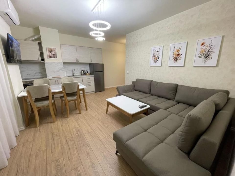 Superior Apartment, City View | Living area | TV