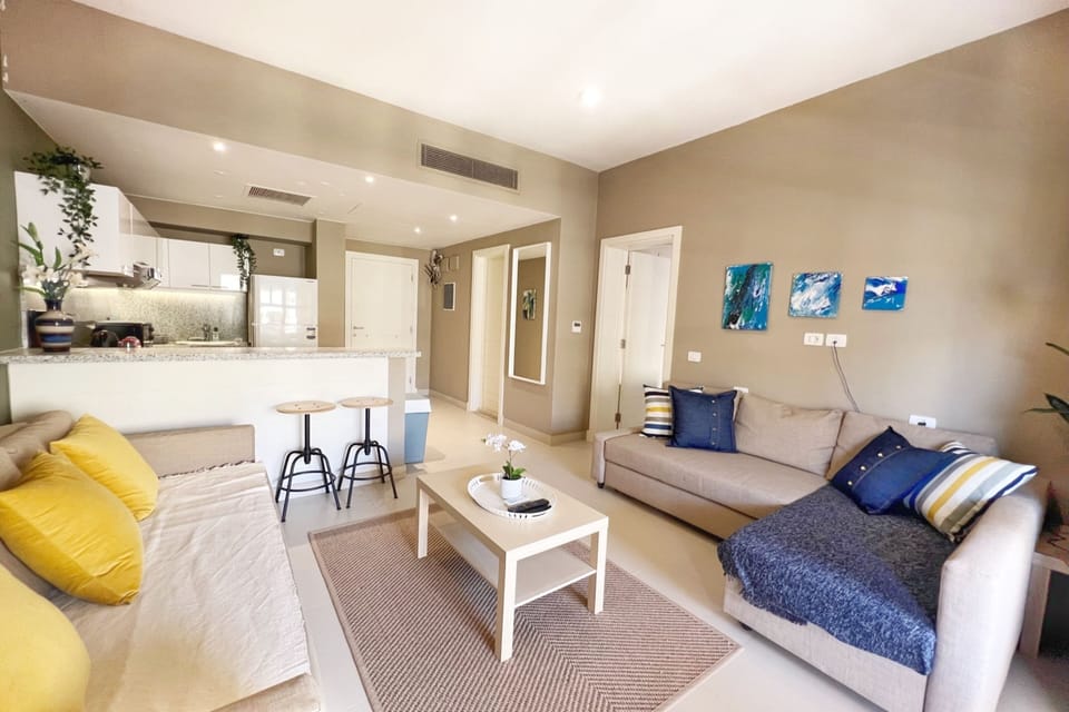 Basic Apartment | Living area | 55-inch Smart TV with cable channels