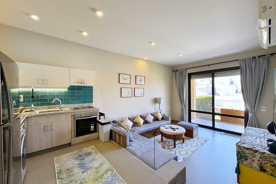 Apartment | Living area | 55-inch Smart TV with cable channels