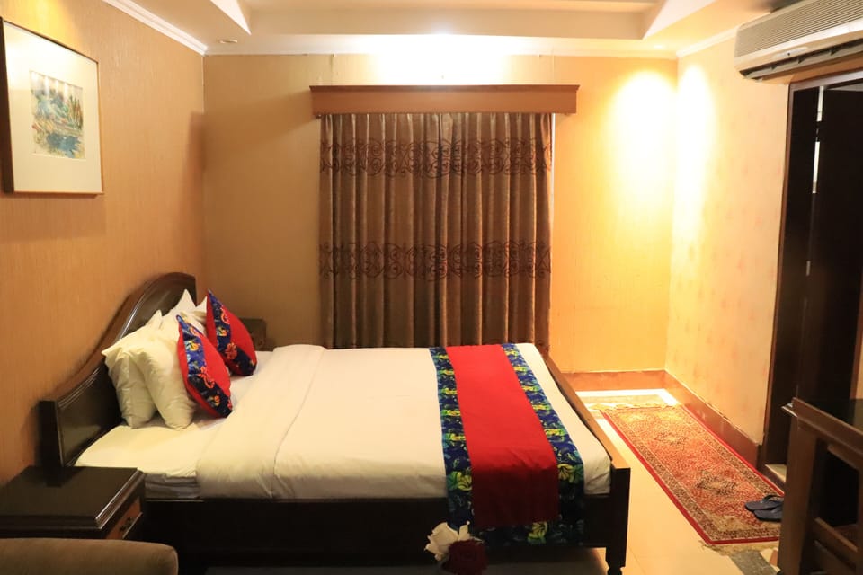 Deluxe Double Room, Air conditioning, City View | In-room safe, desk, laptop workspace, soundproofing