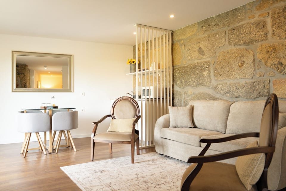 Deluxe Suite, 1 King Bed | Living area | TV