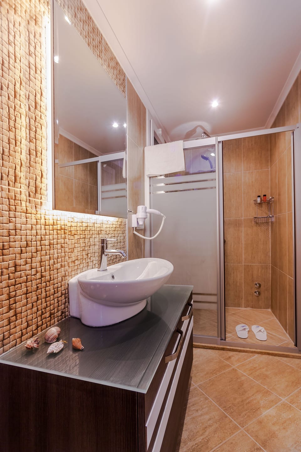 Shower, free toiletries, hair dryer, slippers
