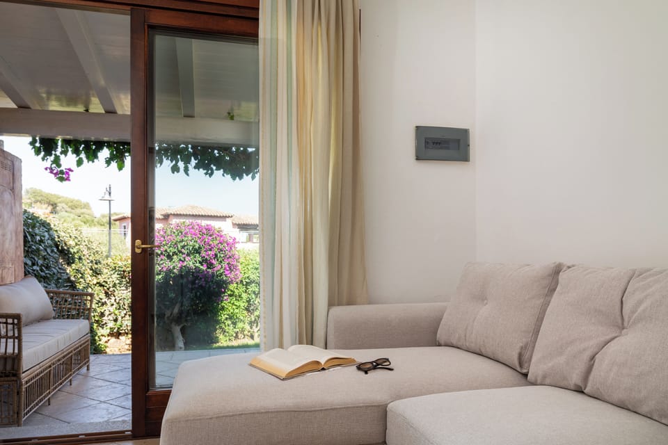 Apartment, 2 Bedrooms, Patio | Living area | 30-inch TV with satellite channels