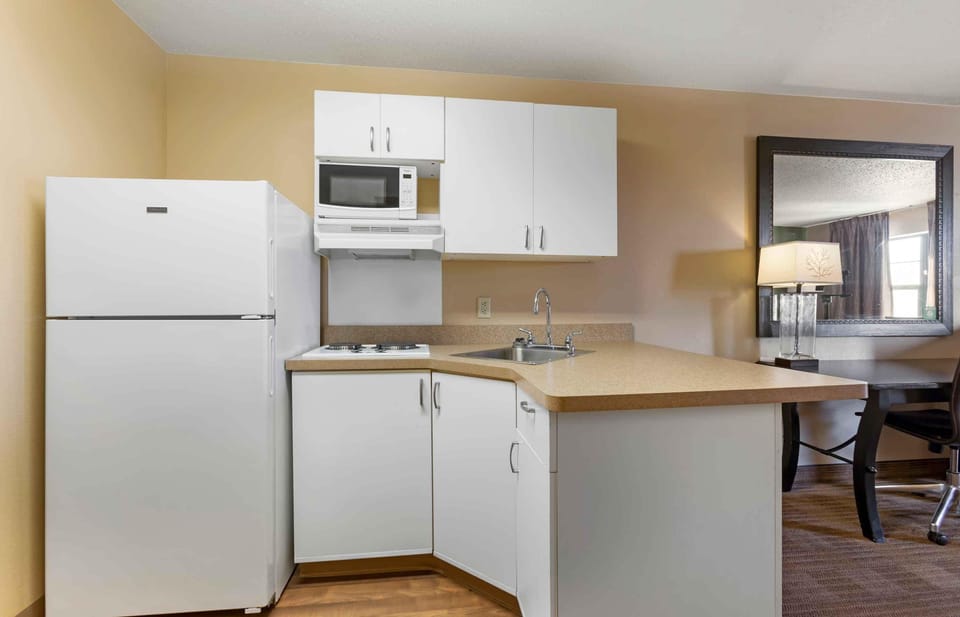 Fridge, microwave, stovetop, coffee/tea maker