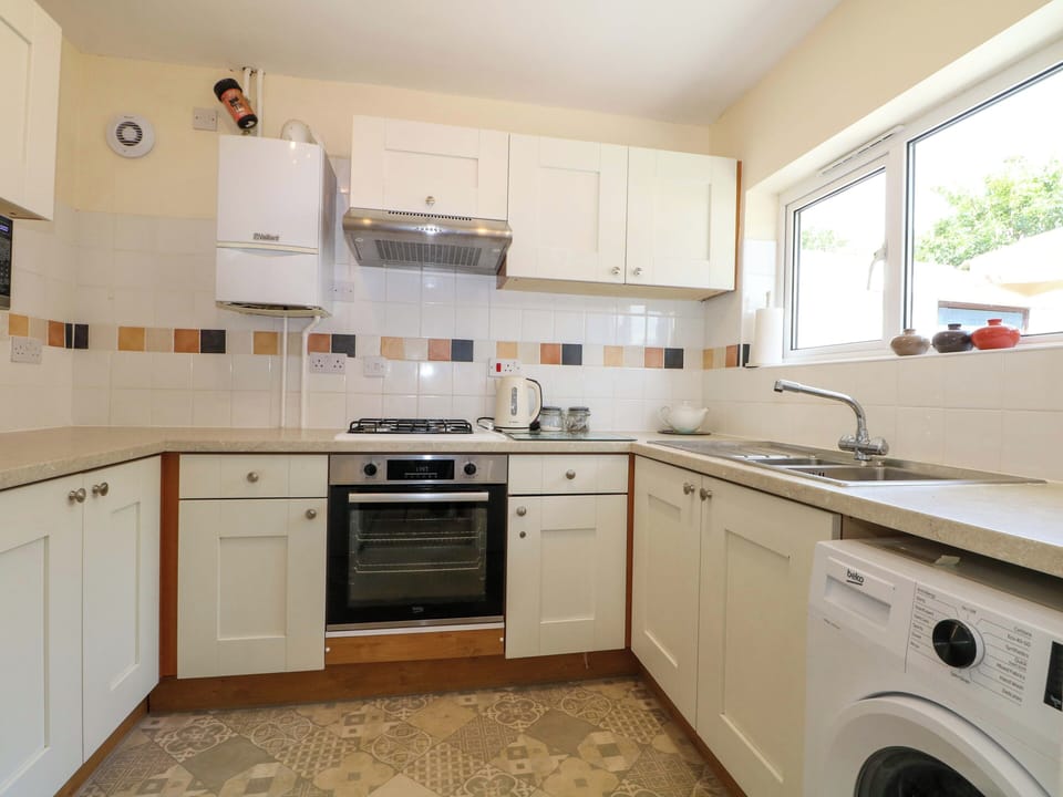 Fridge, microwave, toaster, cookware/dishes/utensils