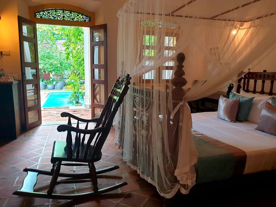 Family Quadruple Room, 2 Bedrooms, Pool View | In-room safe, desk, soundproofing, free WiFi
