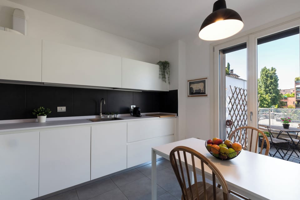 Deluxe Duplex, City View | Private kitchen | Espresso maker, full-size fridge, microwave, oven