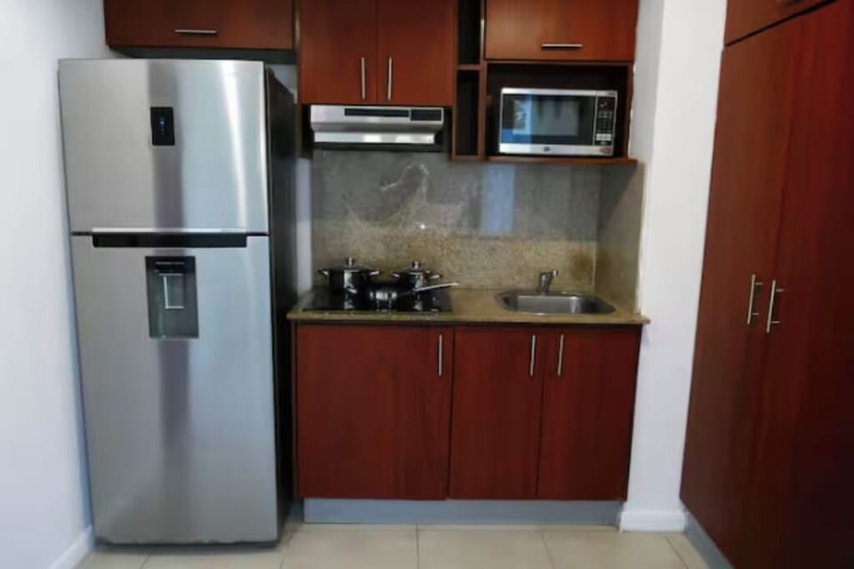 Deluxe Suite, River View | Private kitchen | Cookware/dishes/utensils