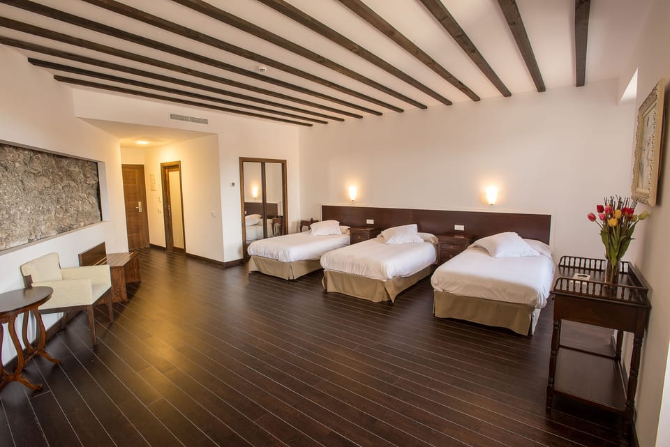 Triple Room | Minibar, in-room safe, desk, cribs (free)