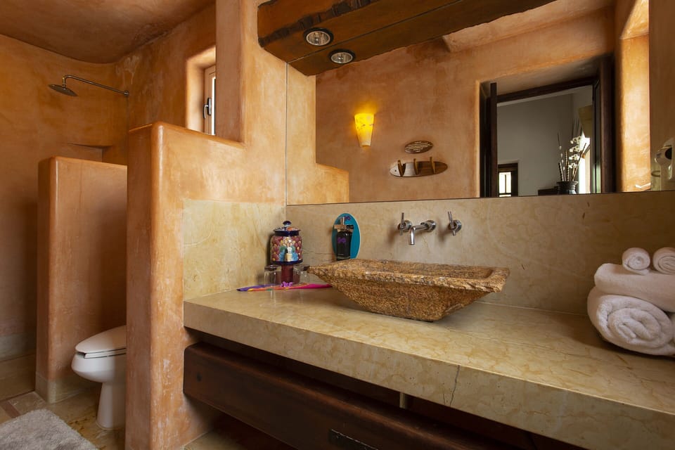 Terrace Suite, 2nd level, non ocean view | Bathroom | Shower, rainfall showerhead, designer toiletries, hair dryer