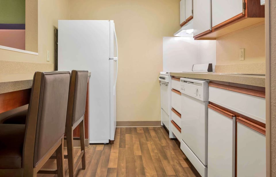 Deluxe Studio, Multiple Beds, Non Smoking | Desk, laptop workspace, blackout drapes, iron/ironing board