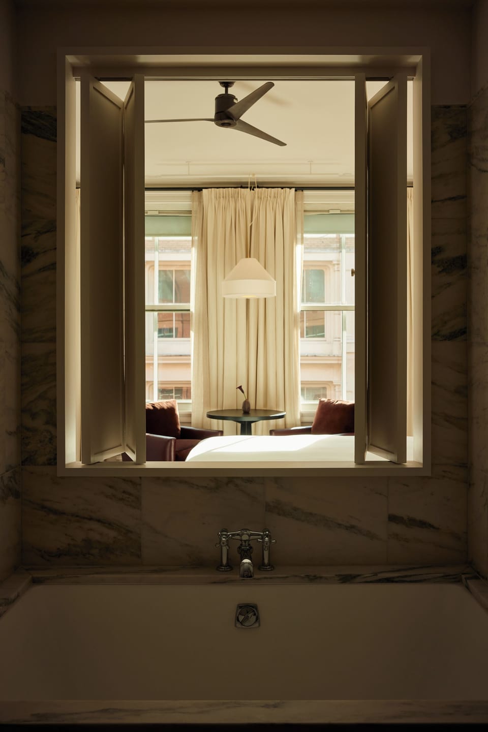 SoHo Studio | Bathroom | Deep soaking tub, hydromassage showerhead, hair dryer, bathrobes