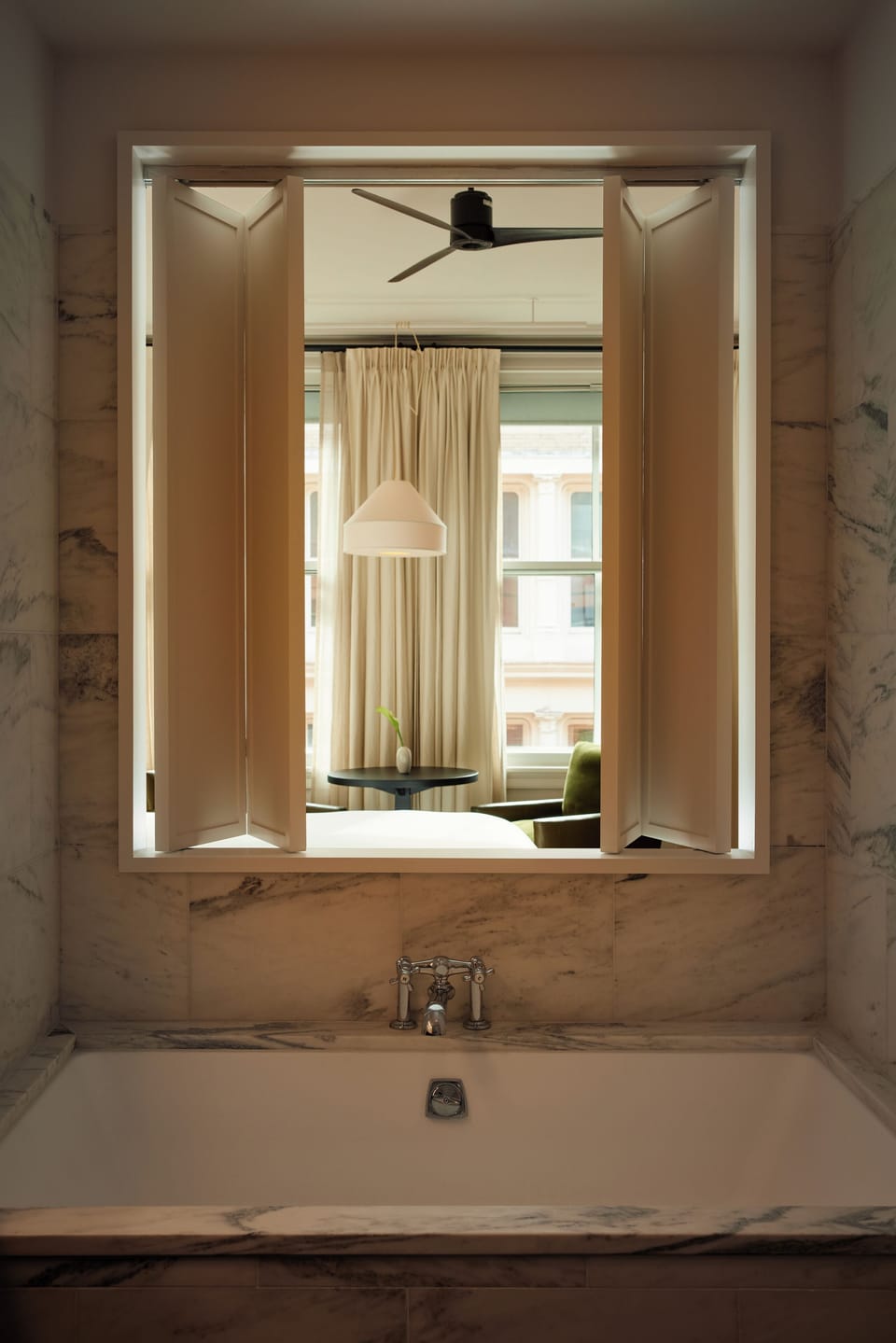 SoHo Deluxe Studio | Bathroom | Deep soaking tub, hydromassage showerhead, hair dryer, bathrobes