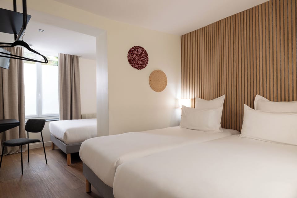 Quadruple Room | Premium bedding, desk, laptop workspace, soundproofing