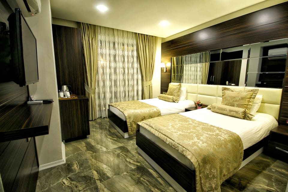 Premium bedding, minibar, soundproofing, free cribs/infant beds