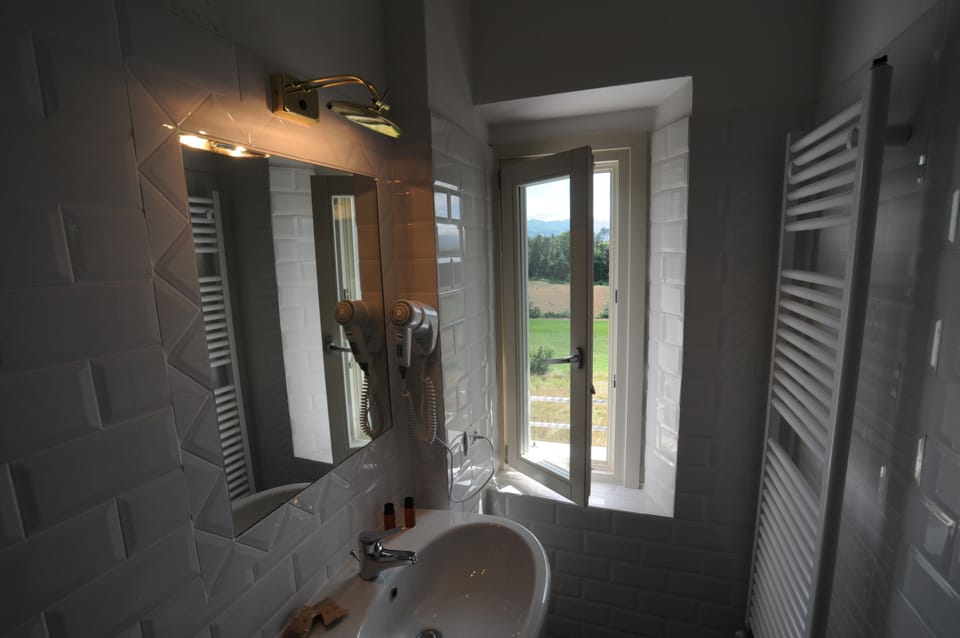 Bathroom | Shower, free toiletries, hair dryer, bidet