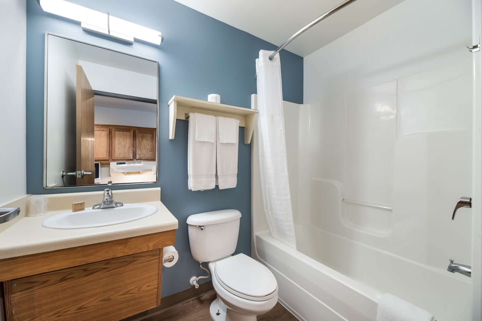 Combined shower/tub, hair dryer, towels, soap