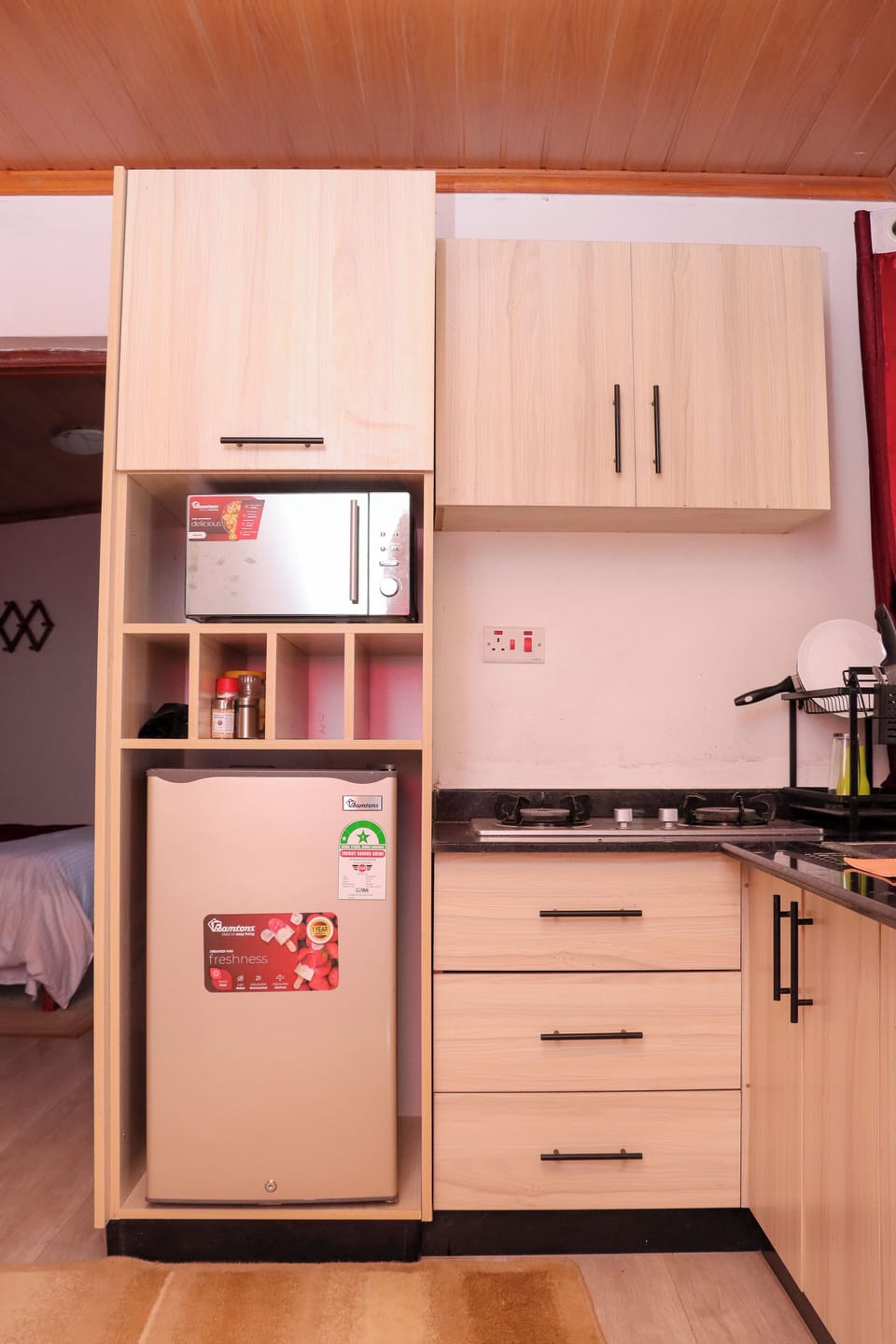 Deluxe Apartment, City View | Private kitchen | Fridge, microwave, cookware/dishes/utensils