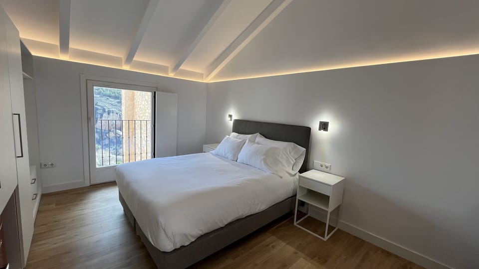 Panoramic Suite, City View | Desk, laptop workspace, soundproofing, iron/ironing board