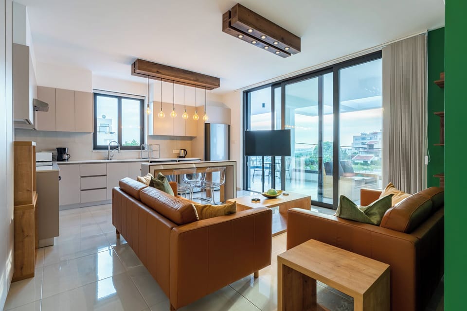 Apartment, 2 Bedrooms, Kitchen, City View | Living room | 55-inch Smart TV with digital channels