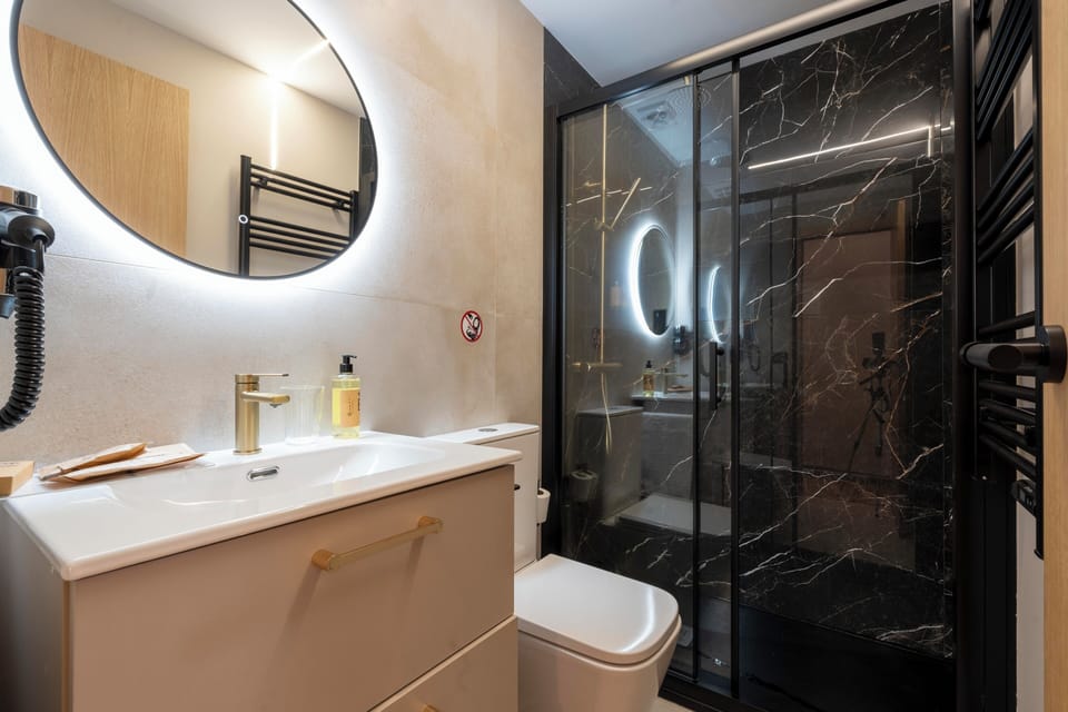 Hair dryer, towels, soap, shampoo