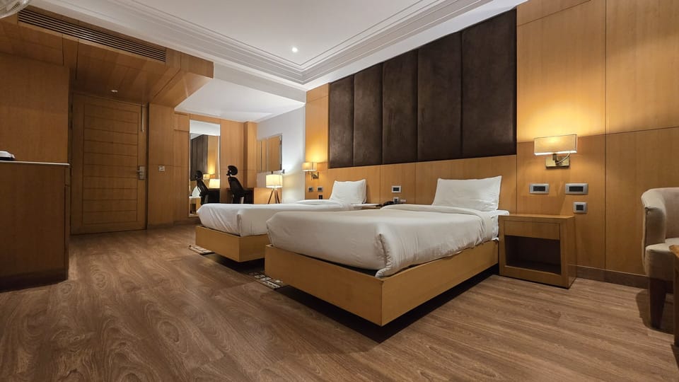 Deluxe Double or Twin Room | In-room safe, desk, laptop workspace, blackout drapes
