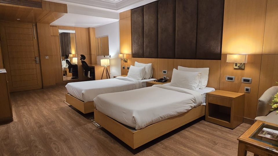 Deluxe Double or Twin Room | In-room safe, desk, laptop workspace, blackout drapes