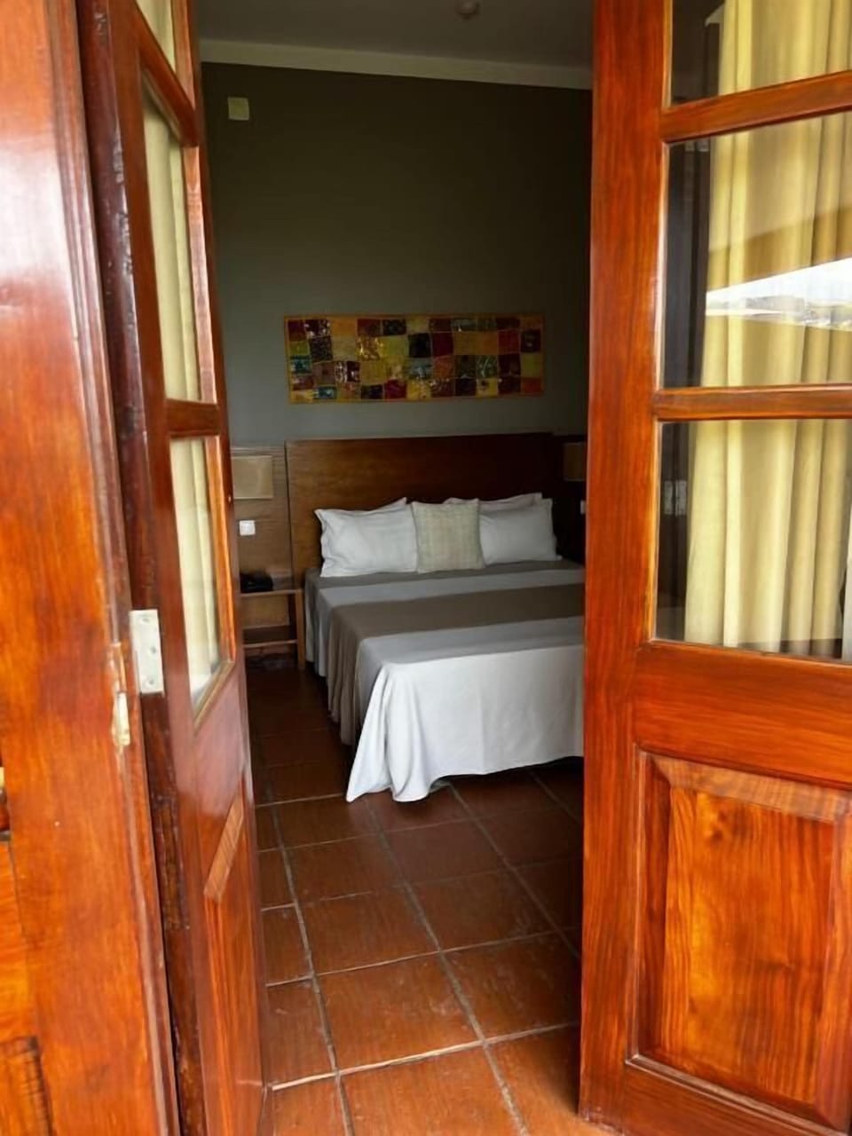 Standard Double or Twin Room | Minibar, in-room safe, individually decorated, individually furnished
