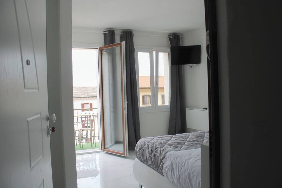 Desk, laptop workspace, free WiFi, bed sheets