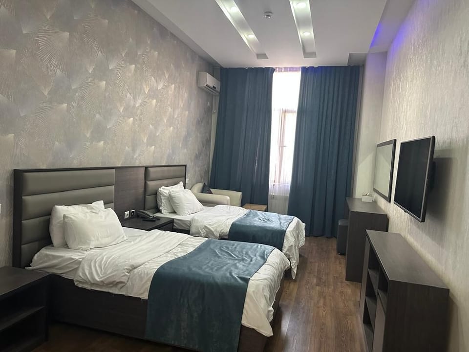 Luxury Twin Room, Courtyard View | In-room safe, desk, blackout drapes, soundproofing