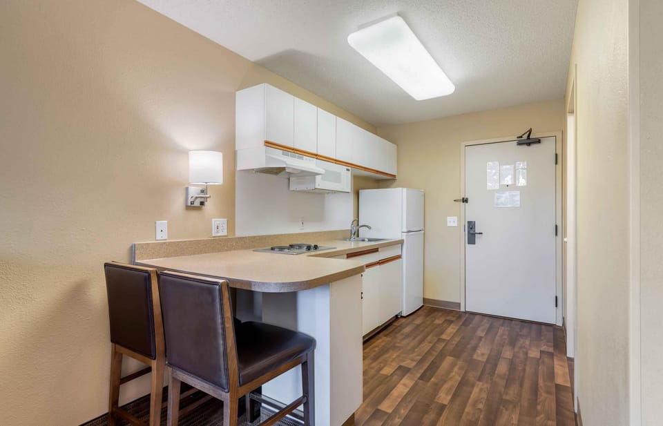 Studio, 1 Queen Bed, Non Smoking | Private kitchen | Coffee/tea maker, full-size fridge, microwave, stovetop