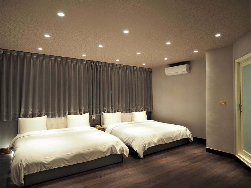 Down comforters, desk, free WiFi, bed sheets