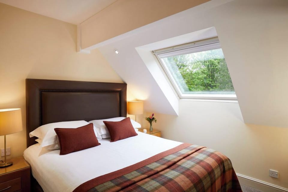 Deluxe Apartment, Multiple Beds | Desk, blackout drapes, iron/ironing board, travel crib