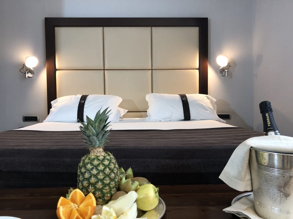 Premium bedding, down comforters, pillowtop beds, minibar