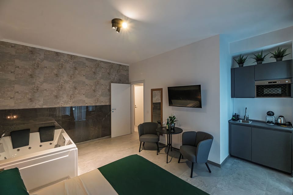 Luxury Double Room, Balcony, Courtyard View | Private kitchenette | Espresso maker, coffee/tea maker, fridge, electric kettle