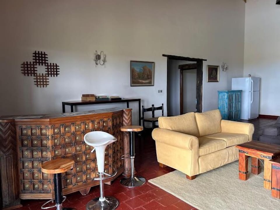 Family Apartment, Pool View | Living area | 24-inch Smart TV with digital channels
