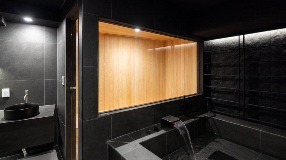 Cavern Room | Bathroom | Hair dryer, bathrobes, slippers, bidet