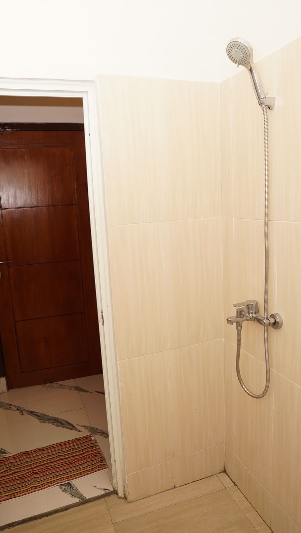 Shower, rainfall showerhead, towels, soap
