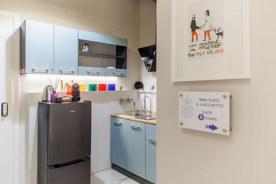 Mini-fridge, microwave, oven, stovetop