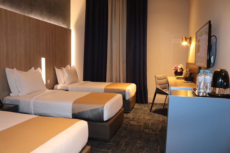 Standard Triple Room, 3 Bedrooms | In-room safe, desk, iron/ironing board, free WiFi