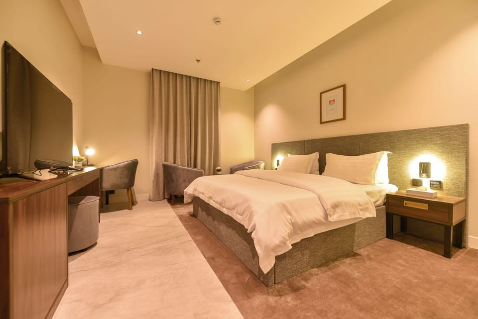 In-room safe, desk, laptop workspace, iron/ironing board