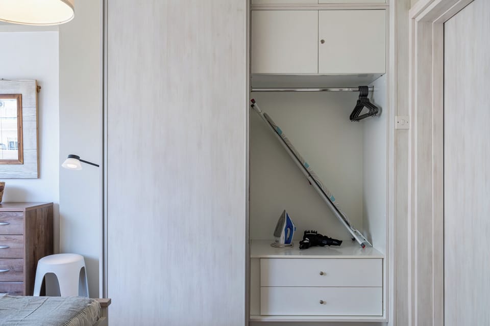 Apartment, 1 Double Bed, Kitchenette, City View | Iron/ironing board, WiFi (free), individually decorated