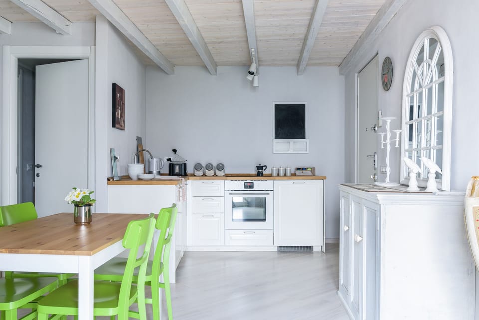 Apartment, Lake View | Private kitchen | Fridge, microwave, oven, stovetop