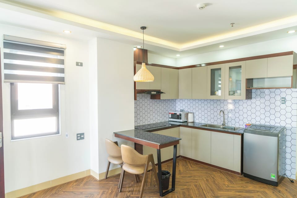 Panoramic Apartment, City View | Private kitchen | Mini-fridge, stovetop