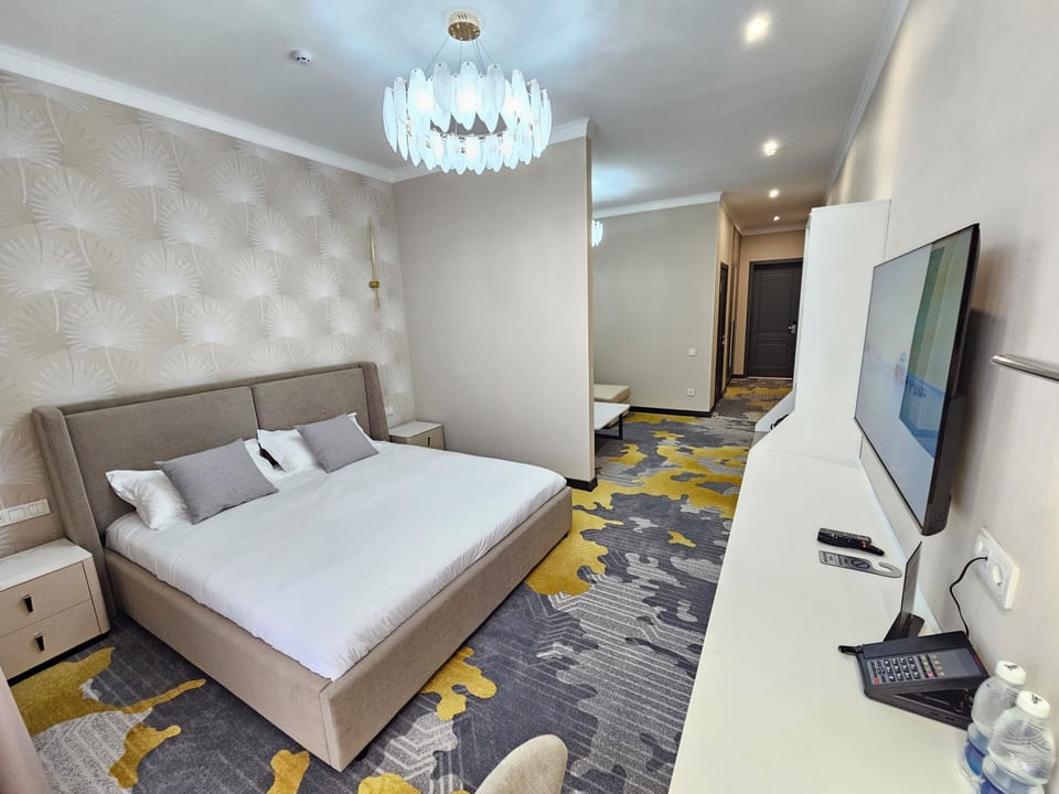 Luxury Suite, City View | Hypo-allergenic bedding, in-room safe, desk, laptop workspace