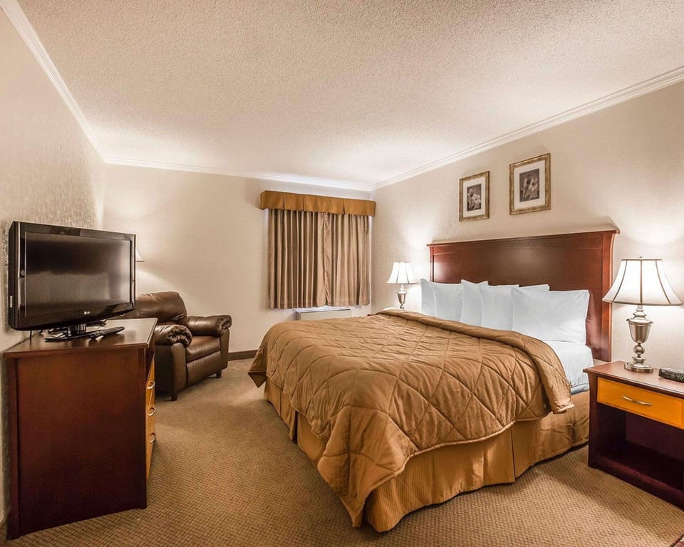 Pillowtop beds, desk, blackout drapes, iron/ironing board